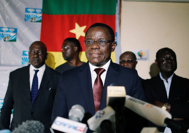 Maurice Kamto, a presidential candidate of Renaissance Movement (MRC), reacts as he holds a news conference at his headquarter in Yaounde, Cameroon October 8, 2018. REUTERS/Zohra Bensemra/File Photo