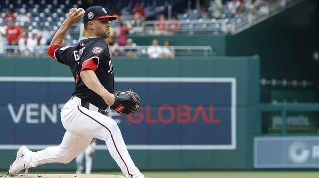 Jul 20, 2025; Washington, District of Columbia, USA; Washington Nationals starting pitcher MacKenzie Gore (1) pitches against the San Diego Padres during the first inning at Nationals Park.