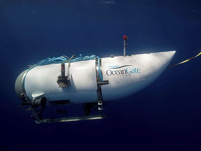 This photo provided by OceanGate Expeditions shows a submersible vessel named Titan used to visit the wreckage site of the Titanic. In a race against the clock on the high seas, an expanding international armada of ships and airplanes searched Tuesday, June 20, 2023, for the submersible that vanished in the North Atlantic while taking five people down to the wreck of the Titanic. (OceanGate Expeditions via AP)