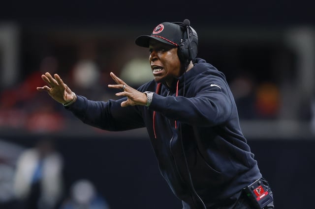 Head coach Raheem Morris of the Atlanta Falcons reacts during the second quarter against the Carolina Panthers at Mercedes-Benz Stadium on January 5, 2025 in Atlanta, Georgia.