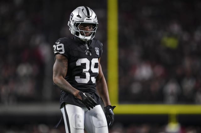 Nate Hobbs #39 of the Las Vegas Raiders looks on from the field during an NFL football game against the Atlanta Falcons at Allegiant Stadium on December 16, 2024 in Las Vegas, Nevada.