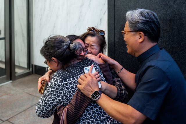Yeonsoo Go, a Purdue student who was detained by immigration authorities in Manhattan last week, embraces her mother after being released from immigration custody, Monday, Aug. 4, 2025, in New York. (AP Photo/Olga Fedorova)