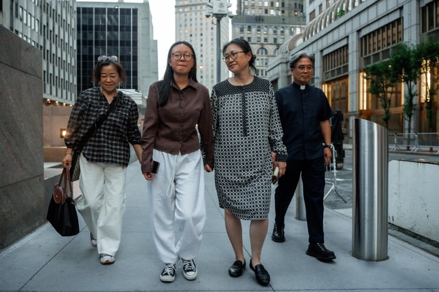 Yeonsoo Go, second left, a Purdue student who was detained by immigration authorities in Manhattan last week, leaves with her mother and members of Korean community after being released from immigration custody, Monday, Aug. 4, 2025, in New York. (AP Photo/Olga Fedorova)