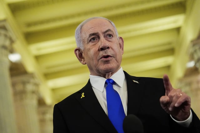 Israeli Prime Minister Benjamin Netanyahu speaks to reporters at the U.S. Capitol following a meeting with House Speaker Mike Johnson, R-La., Tuesday, July 8, 2025, in Washington. (AP Photo/Julia Demaree Nikhinson)