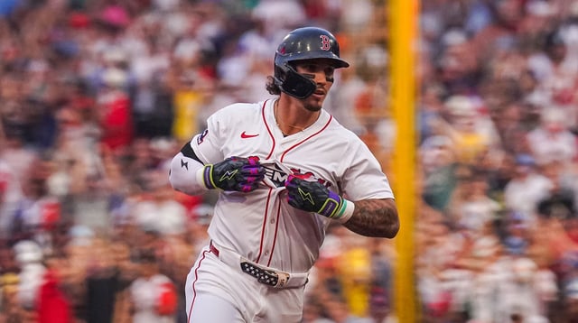 Aug 4, 2025; Boston, Massachusetts, USA; Boston Red Sox outfielder Jarren Duran (16) hits a three run home run against the Kansas City Royals in the first inning at Fenway Park. Mandatory Credit: David Butler II-Imagn Images