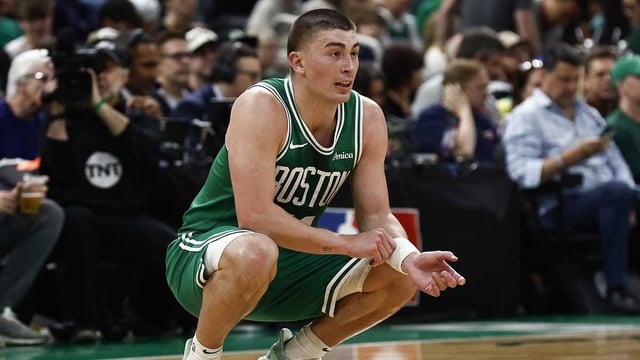 Apr 23, 2025; Boston, Massachusetts, USA; Boston Celtics guard Payton Pritchard (11) looks on during the second quarter of game two of the first round of the 2024 NBA Playoffs against the Orlando Magic at TD Garden. Mandatory Credit: Winslow Townson-Imagn Images