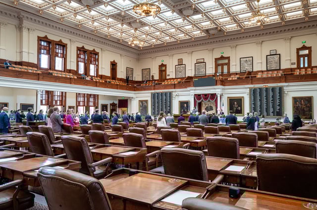Many seats remain empty during the House's call to order at the state Capitol on August 5 in Austin, Texas.