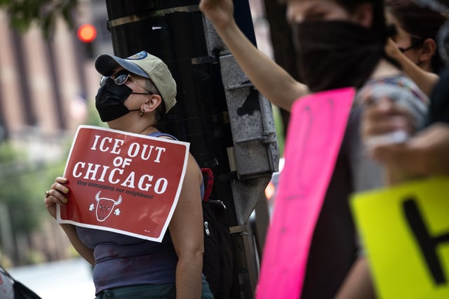 Demonstrators protest outside of a U.S. Immigration and Customs Enforcement (ICE) field office on July 28, 2025 in Chicago, Illinois.