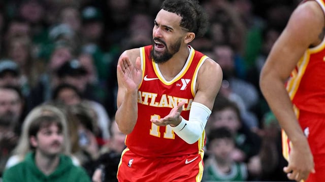 `Jan 18, 2025; Boston, Massachusetts, USA; Atlanta Hawks guard Trae Young (11) reacts after scoring against the Boston Celtics during the fourth quarter at the TD Garden. Mandatory Credit: Brian Fluharty-Imagn Images