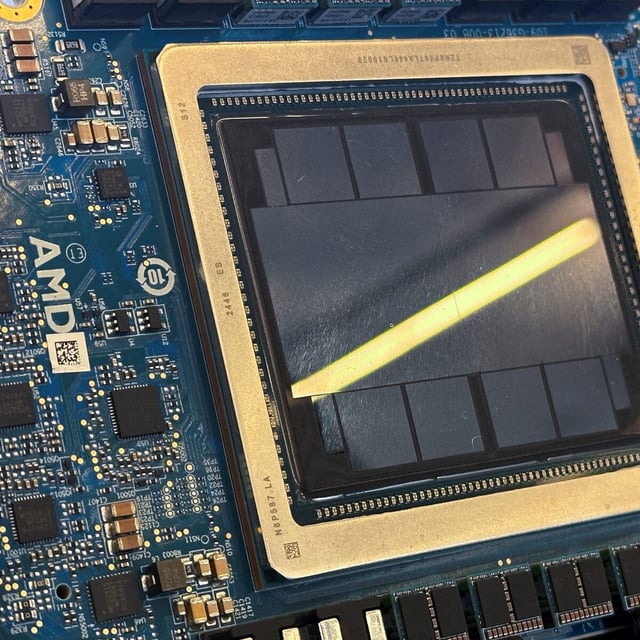 FILE PHOTO: An Advanced Micro Devices (AMD) MI350 series artificial intelligence chip is displayed at the San Jose McEnery Convention Center, in San Jose, California, U.S.,  June 12, 2025. REUTERS/Max A. Cherney/File Photo