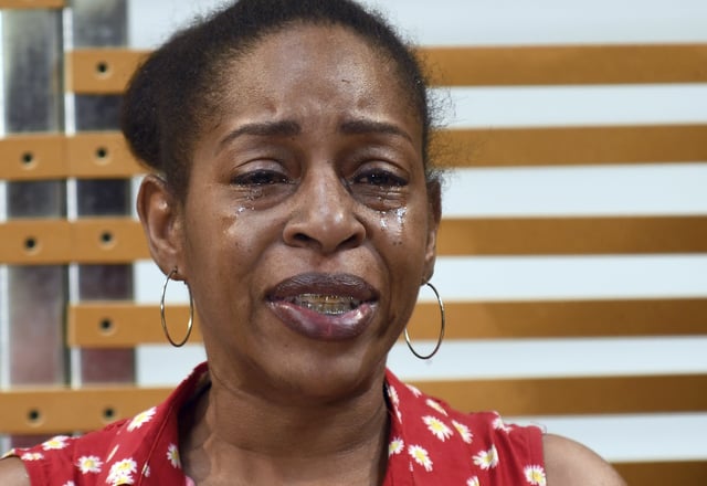 Taushica Carter, whose son Rashaud Johnson was fatally shot during a confrontation with a police officer in Aurora, Colo., speaks at a news conference in Denver on Tuesday, Aug. 5, 2025. (AP Photo/Thomas Peipert)