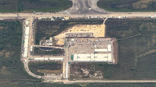 An aerial view of a migrant detention center, dubbed Alligator Alcatraz, is seen located at the site of the Dade-Collier Training and Transition Airport i