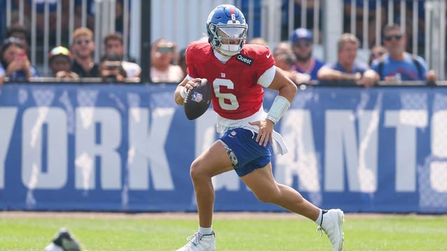 Aug 4, 2025; East Rutherford, NJ, USA; New York Giants quarterback Jaxson Dart (6) scrambles during training camp at Quest Diagnostics Training Center. Mandatory Credit: Vincent Carchietta-Imagn Images