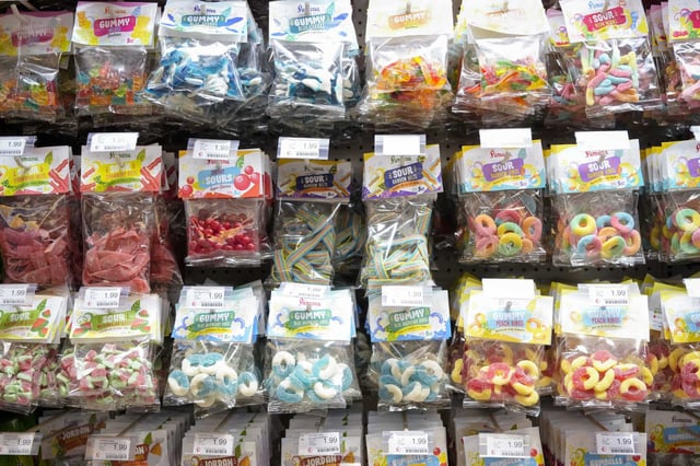 Candies are on display at Seafood City Supermarket in 2023 in Sugar Land. Texas is one of the 12 states that have banned certain foods from SNAP eligibility. In Texas, that includes sweetened candies and sodas. 
