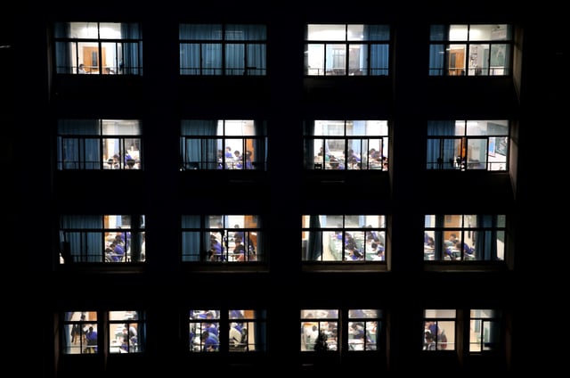 Students who are about to take the college entrance examination are having evening self-study in the classroom in Lianyungang City, Jiangsu Province, China on the evening of June 3, 2025.