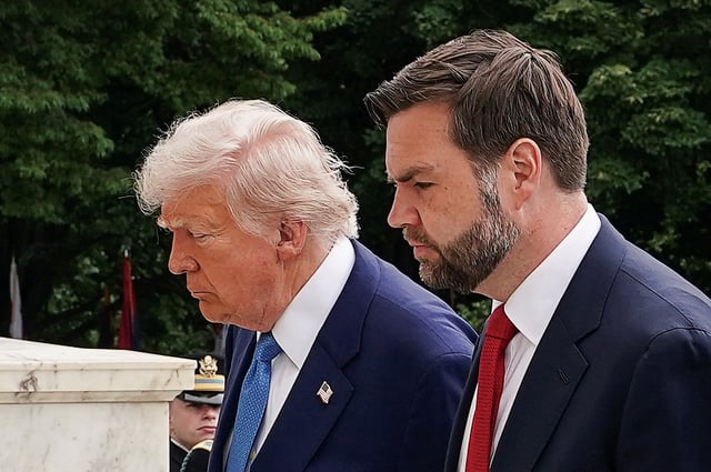 U.S. President Donald Trump and Vice President JD Vance take part in ceremonies in commemoration of the Memorial Day holiday, at Arlington National Cemetery in Arlington, Virginia, U.S., May 26, 2025. REUTERS/Ken Cedeno/File Photo