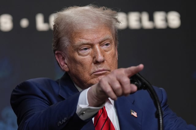 President Donald Trump speaks before signing an executive order about the 2028 Los Angeles Olympic Games, in the South Court Auditorium of the Eisenhower Executive Office Building on the White House campus, Tuesday, Aug. 5, 2025, in Washington. (AP Photo/Julia Demaree Nikhinson)
