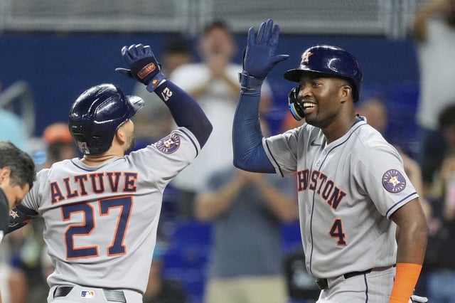 Jose Altuve celebrates with Jesús Sánchez after staking the Astros to a first-inning lead, one they wouldn&#39;t relinquish in Tuesday&#39;s 7-3 win at Miami.