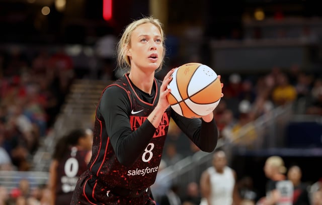 Sophie Cunningham #8 of the Indiana Fever shoots against the Las Vegas Aces at Gainbridge Fieldhouse on July 24, 2025 in Indianapolis, Indiana.