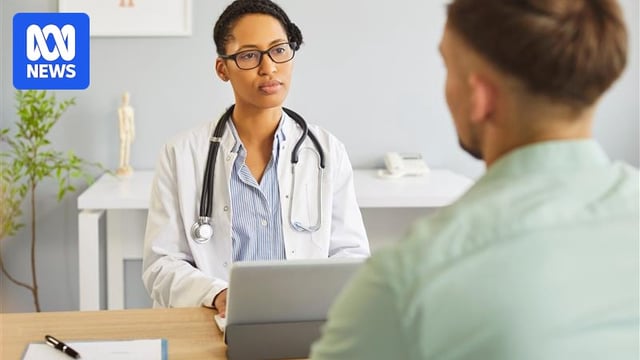 A generic image of a female doctor talking to an unidentifiable male patient