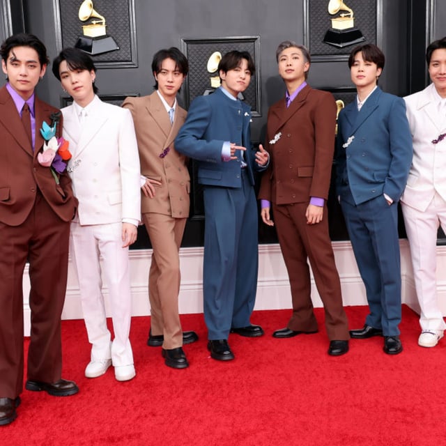 (L-R) V, Suga, Jin, Jungkook, RM, Jimin and J-Hope of BTS attend the 64th Annual GRAMMY Awards at MGM Grand Garden Arena on April 03, 2022 in Las Vegas, Nevada.