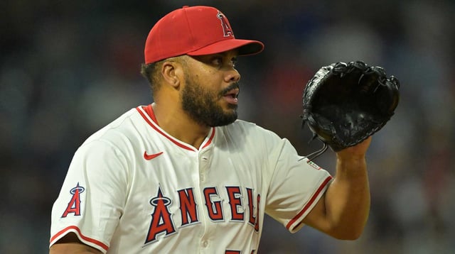 Jul 28, 2025; Anaheim, California, USA; Los Angeles Angels relief pitcher Kenley Jansen (74) earns a save against the Texas Rangers in the ninth inning at Angel Stadium. Mandatory Credit: Jayne Kamin-Oncea-Imagn Images