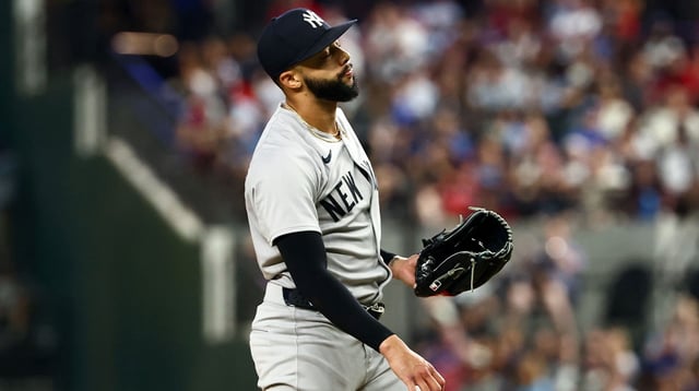 Aug 5, 2025; Arlington, Texas, USA; New York Yankees relief pitcher Devin Williams (38) reacts during the eighth inning against the Texas Rangers at Globe Life Field. Mandatory Credit: Kevin Jairaj-Imagn Images