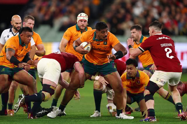 MELBOURNE, AUSTRALIA - JULY 26: Will Skelton of the Wallabies evades a tackle during the second test of the series between Australia Wallabies and British &amp; Irish Lions at the Melbourne Cricket Ground on July 26, 2025 in Melbourne, Australia. (Photo by Morgan Hancock/Getty Images)