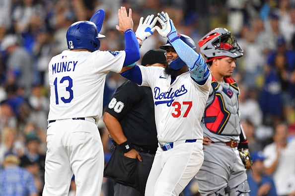 LOS ANGELES, CA – AUGUST 05: Los Angeles Dodgers outfielder Teoscar Hernandez (37) celebrates with Los Angeles Dodgers third baseman Max Muncy (13) after hitting his second home run of the MLB game between the St. Louis Cardinals and the Los Angeles Dodgers on August 5, 2025 at Dodger Stadium in Los Angeles, CA. (Photo by Brian Rothmuller/Icon Sportswire via Getty Images)