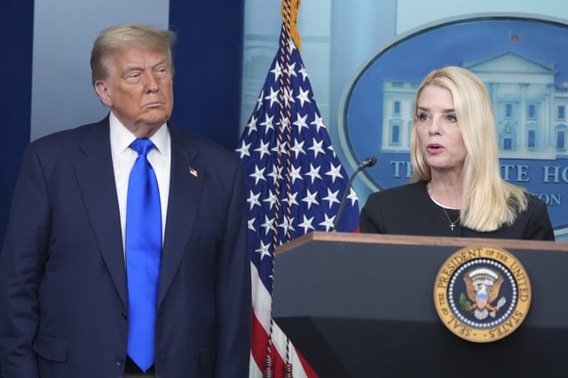 Attorney General Pam Bondi speaks to reporters as President Donald Trump listens, Friday, June 27, 2025, in the briefing room of the White House in Washington.