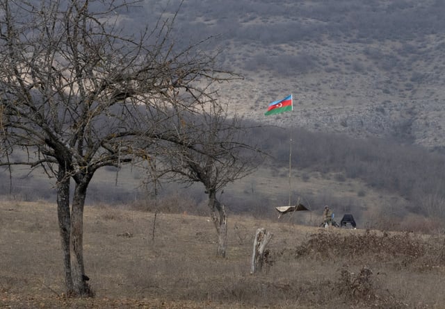 An Azeri soldier is seen at fighting positions near the village of Taghavard in the region of Nagorno-Karabakh, January 18, 2021. Picture taken January 18, 2021. REUTERS/Artem Mikryukov/File Photo