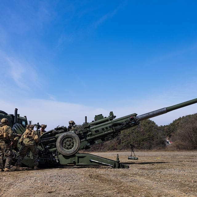 U.S. Marines with M777 howitzer. Photo by Rodney Frye