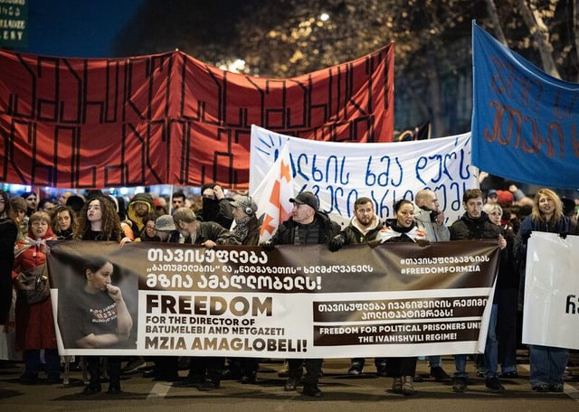 Several thousand demonstrators gather in front of the Georgian Public Broadcasting (GPB) building, block the avenue, and demonstrate all the way to the Parliament. They ask for the release of regime's prisoners and of Mzia Amaglobeli, who is on a hunger strike for 19 days. A protest against the Georgian government's postponement of European Union accession talks until 2028 takes place for the 63rd consecutive day in Tbilisi, Georgia, on January 29, 2025. (Photo by Jerome Gilles/NurPhoto via Getty Images)