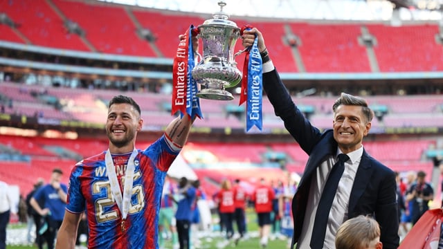 Joel Ward, left, and chairman Parish celebrate the victory at Wembley
