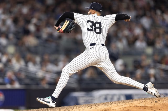 NEW YORK, NEW YORK - JUNE 27: Devin Williams #38 of the New York Yankees throws a pitch during the ninth inning of the game against the Athletics at Yankee Stadium on June 27, 2025 in New York City.