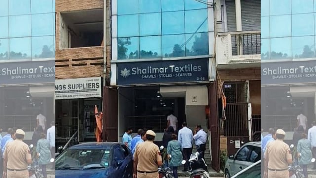 A Jammu and Kashmir counter-intelligence team raiding 'Shalimar Textiles' on 6 August in Delhi's Lajpat Nagar | By Special Arrangement