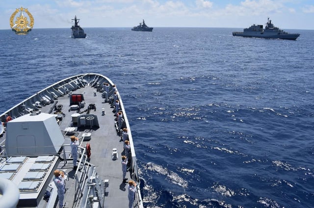 Philippine guided missile frigate BRP Miguel Malvar, Indian guided-missile destroyer INS Delhi, and Indian anti-submarine corvette INS Kiltan navigate side by side during an exercise.