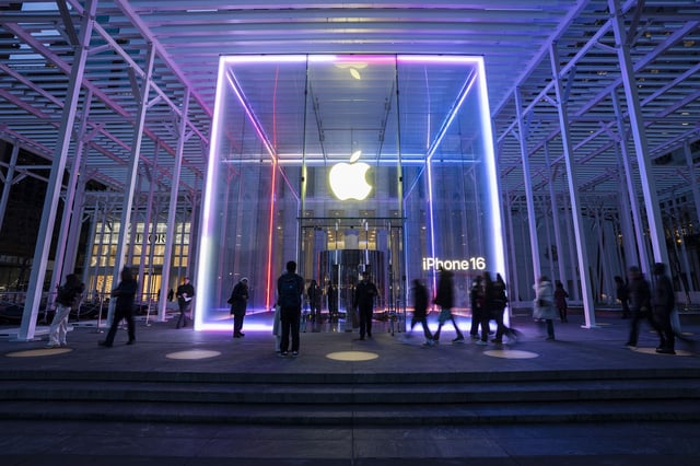 People walk by the Apple Store on Fifth Avenue on February 24, 2025 in New York City.