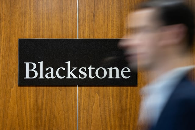 Signage is seen at the Blackstone Group headquarters in New York City, U.S., January 18, 2023. REUTERS/Jeenah Moon/File photo