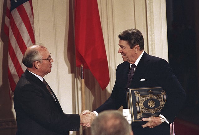 FILE - In this Dec. 8, 1987, file photo, U.S. President Ronald Reagan, right, shakes hands with Soviet leader Mikhail Gorbachev after the two leaders signed the Intermediate Range Nuclear Forces Treaty to eliminate intermediate-range missiles during a ceremony in the White House East Room in Washington. (AP Photo/Bob Daugherty, File)
