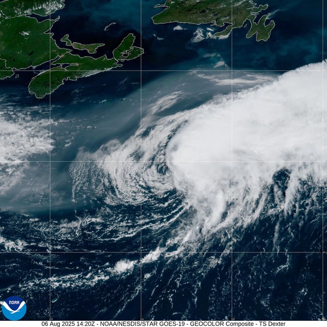 Tropical Storm Dexter, seen here as a spiraling cluster of clouds in this weather satellite photo taken Wednesday morning, churns across the North Atlantic.