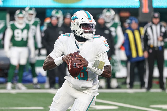 Jan 5, 2025; East Rutherford, New Jersey, USA; Miami Dolphins quarterback Tyler Huntley (18) drops back to pass during the first quarter against the New York Jets at MetLife Stadium. Mandatory Credit: Vincent Carchietta-Imagn Images/ File Photo