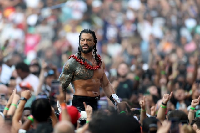 EAST RUTHERFORD, NEW JERSEY - AUGUST 02: Roman Reigns makes an entrance before the tag team match during the WWE 2025 SummerSlam at MetLife Stadium on August 02, 2025 in East Rutherford, New Jersey.
