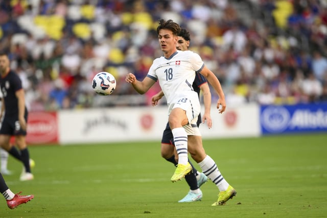 Jun 10, 2025; Nashville, Tennessee, USA;  Switzerland midfielder Ardon Jashari (18) kicks the ball against the United States during the first at Geodis Park. Mandatory Credit: Steve Roberts-Imagn Images/ File Photo
