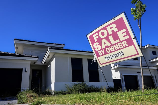 A &#39;for sale&#39; sign sits in front of a single family home on August 01, 2025 in Miami, Florida.