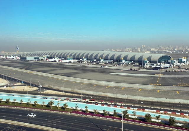 Airliners are seen on the tarmac in a general view of Dubai International Airport in Dubai, United Arab Emirates January 13, 2021. Picture taken through a window. REUTERS/Abdel Hadi Ramahi/File Photo