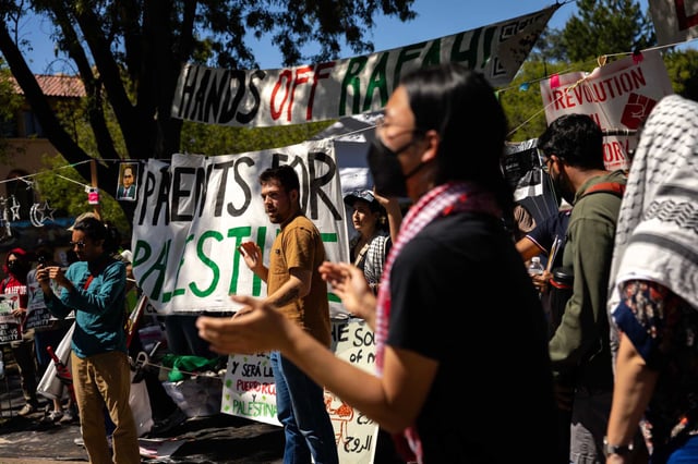 Pro-Palestine supporters rally at Stanford&#39;s White Plaza on May 12, 2024. Stanford’s student newspaper sued the Trump administration on Wednesday for threatening to deport any noncitizen who criticizes Israel or U.S. foreign policy.