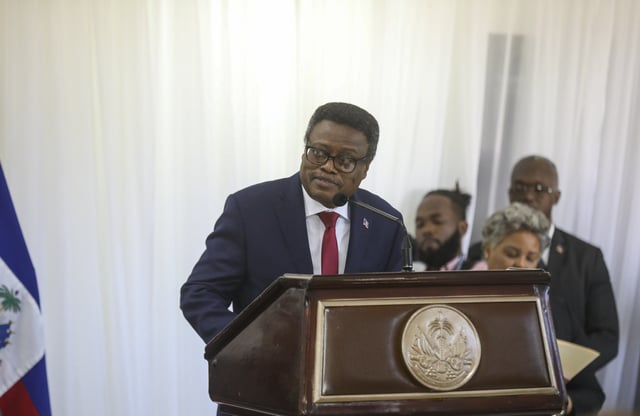 FILE - Fritz Alphonse Jean, an economist and former central bank governor, who replaces Leslie Voltaire in the rotating presidency of the transitional presidential council, speaks during his installation ceremony in Port-au-Prince, Haiti, March 7, 2025. (AP Photo/Odelyn Joseph, File)