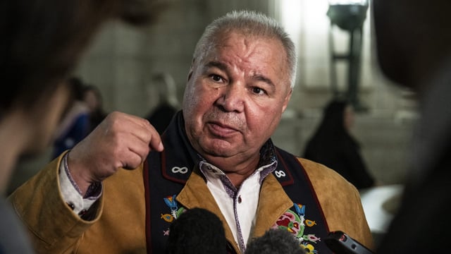 President of the Manitoba Metis Federation David Chartrand speaks to media after the completion of the 43rd Manitoba legislature throne speech at the Manitoba Legislative Building in Winnipeg on November 21, 2023. THE CANADIAN PRESS/Aaron Vincent Elkaim
