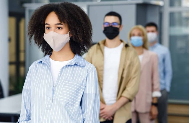 During the COVID-19 pandemic, most public indoor spaces required people to stand six-feet apart for social distancing when standing in line. (Photo by Prostock-studio on Shutterstock)